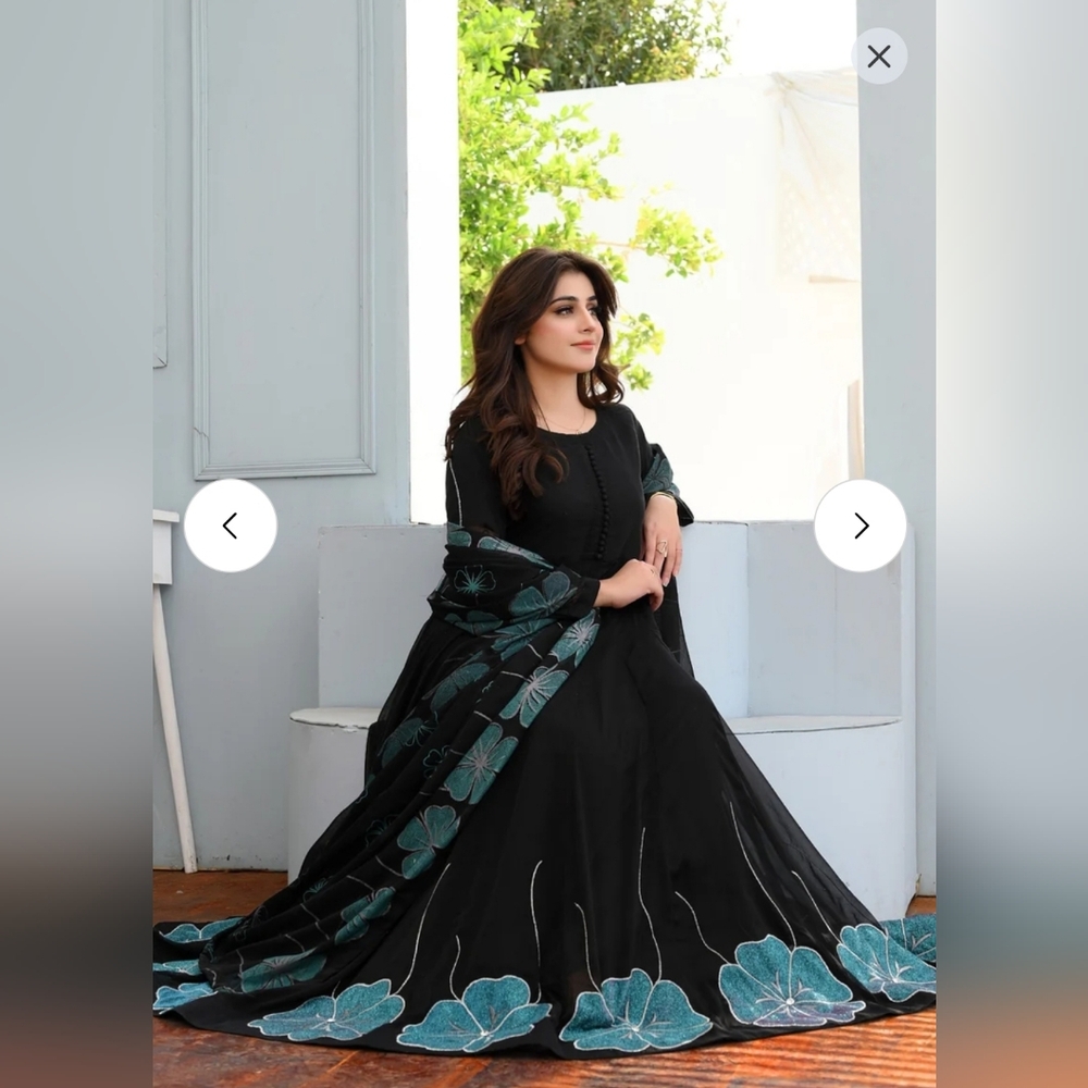 Elegant Black Dress with Teal Floral Accents